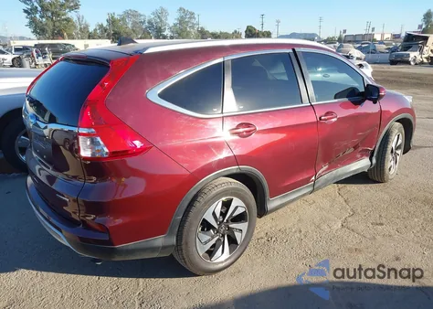 2016 Honda Cr-V Touring z USA, uszkodzony, nr VIN 5J6RM3H98GL020919